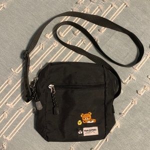 Yak Pak black crossbody bag